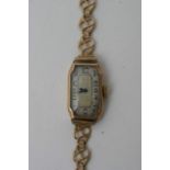 A 9ct gold Art Deco style ladies watch with Arabic