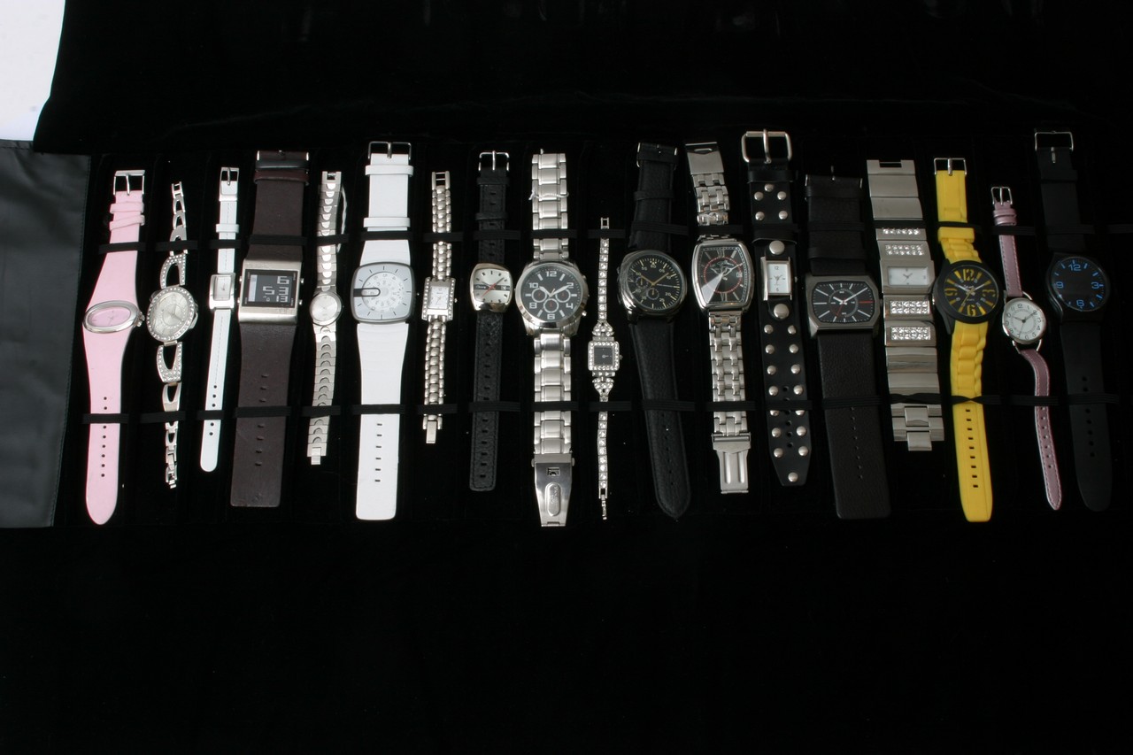 A roll up case of 18 salesman sample watches