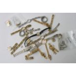 Bag of assorted rotary parts including cases, stra