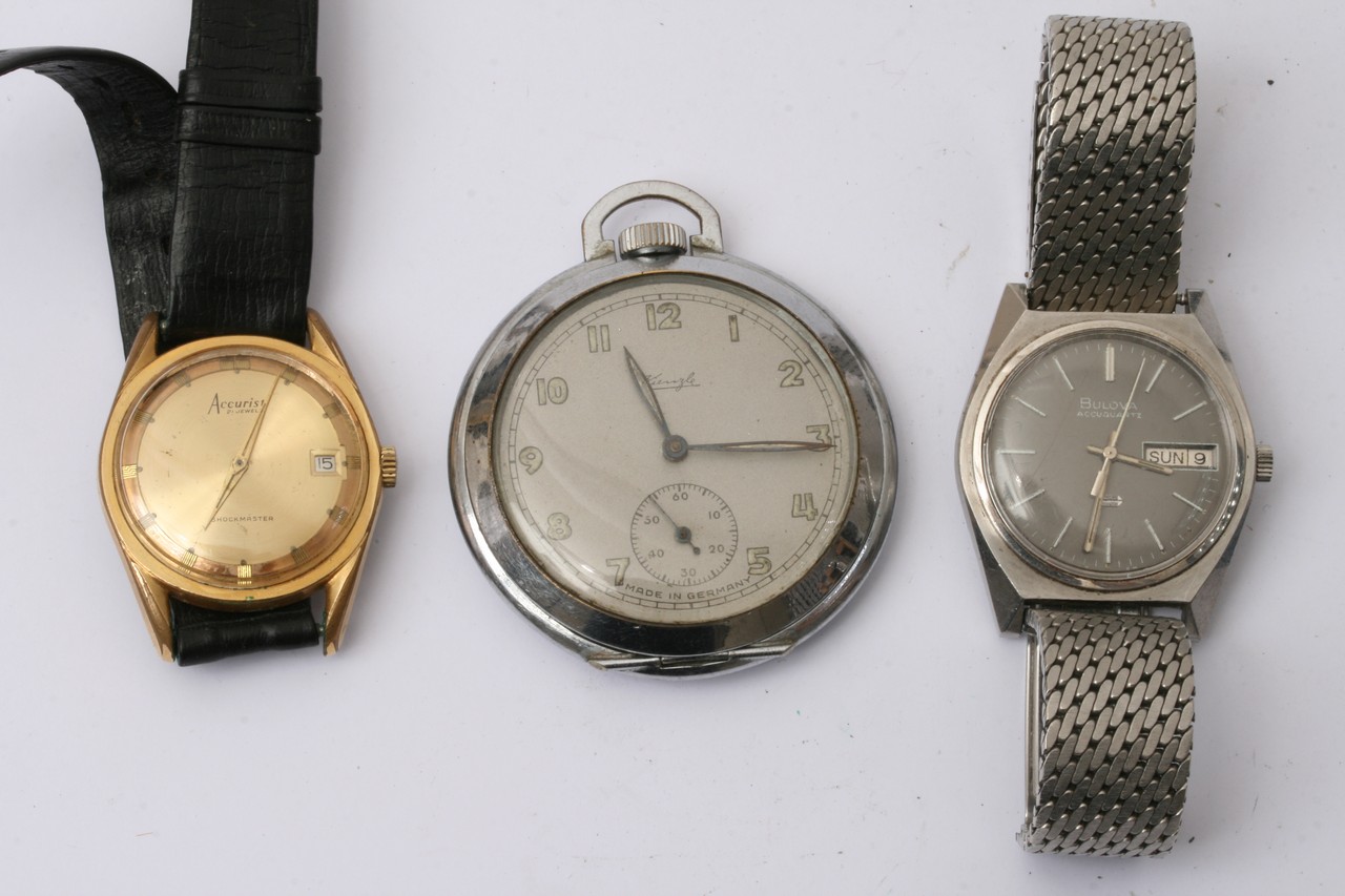 A vintage Bulova day/ date Accuquartz watch and an