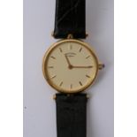 A Rotary wristwatch with gold tone case and black