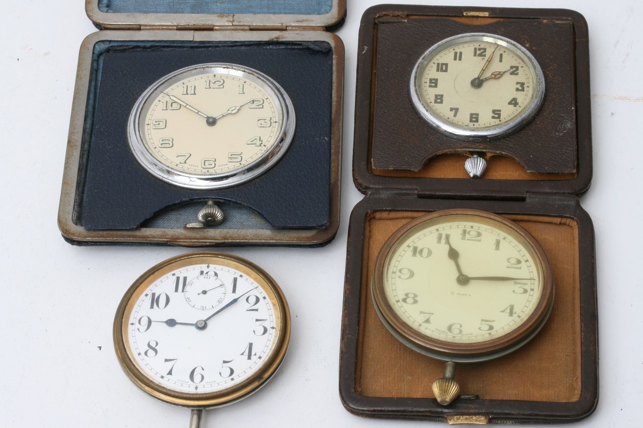 Four vintage traveling clocks with Swiss movements