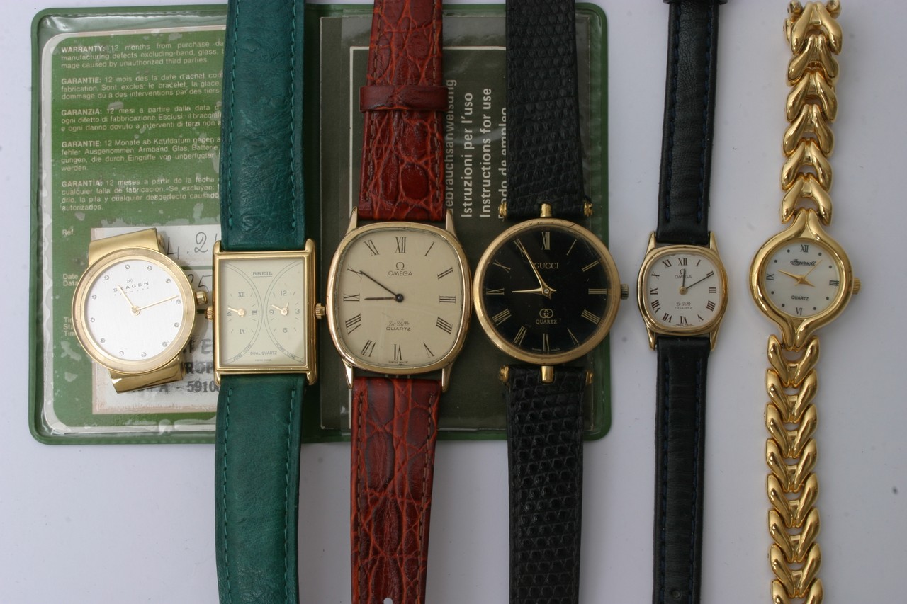 A bag containing six watches including Omega and G