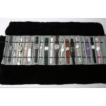 A roll up case of 18 salesman sample watches