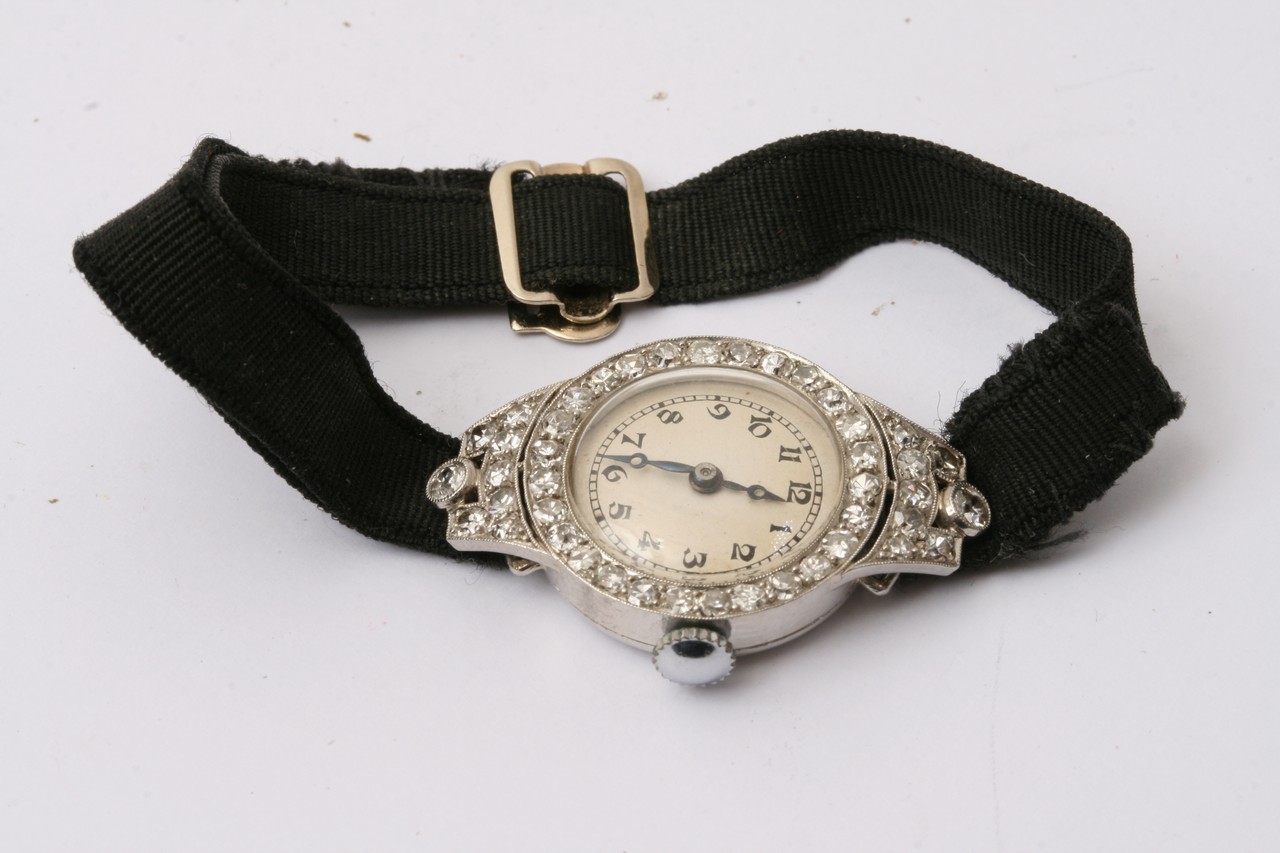 A vintage lady's cocktail watch set with diamonds. - Image 2 of 4