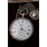 A Silver cased button wind pocket watch with attac