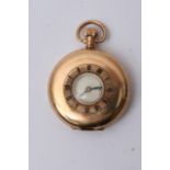 A 9ct Gold half Hunter pocket watch with button-wi