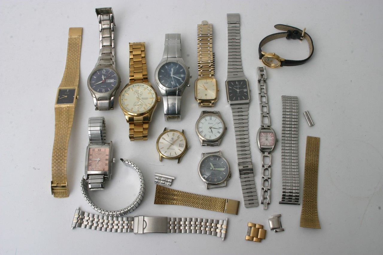 A collection of used worn watches including a Seko