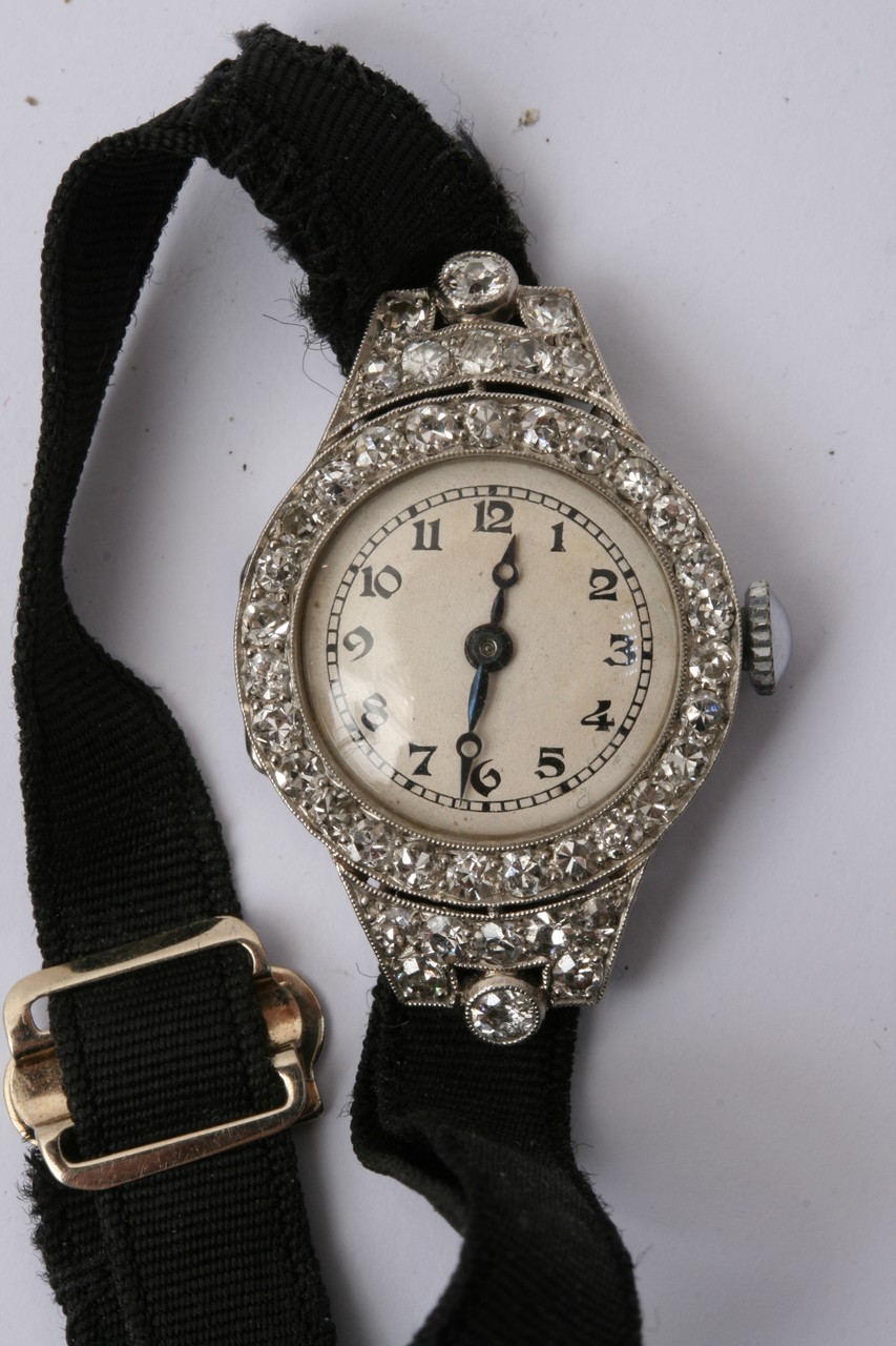 A vintage lady's cocktail watch set with diamonds.