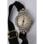 A vintage lady's cocktail watch set with diamonds.
