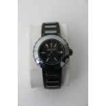 A boxed Swarovski watch black enamel finish stainl