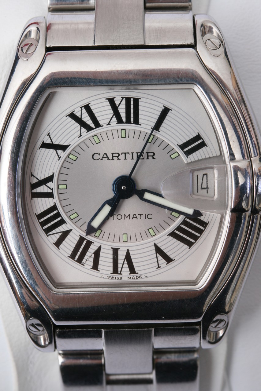 A Gents Cartier Roadster watch finished in polishe