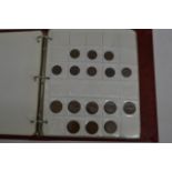 A red album of coins including half crowns, florin