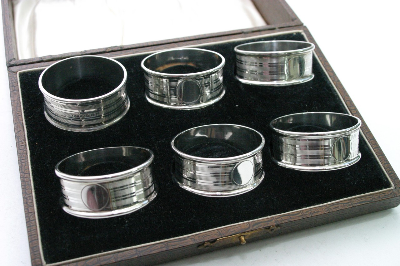 A cased set of six silver napkin rings, Birmingham