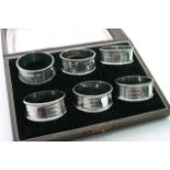 A cased set of six silver napkin rings, Birmingham