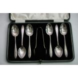 A cased set of six silver spoons with tongs, Birmi