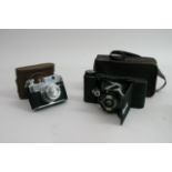Two vintage cameras comprising a Bencenni Comet an