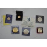 A small collection of coins comprising United Stat