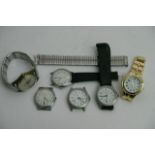 A collection of various wristwatches.