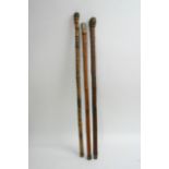 Three Meiji period Japanese walking sticks all car