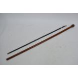 A swagger stick with Napoleonic soldier finial and