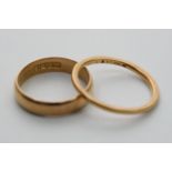 Two 22ct gold rings of indistinct style, approxima