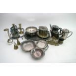 A box of silver plated items and brassware.