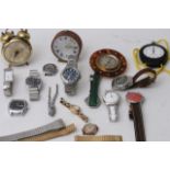 A bag of various watches and oddments