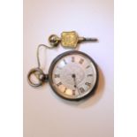A small silver cased Swiss key wind pocket watch.