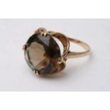 A vintage 9ct gold ring set with a smoky quartz st