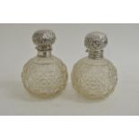 A par of silver and glass scent bottles the cut gl