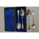 Two pairs of silver table spoons (267 grams)