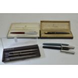 Seven pens to include three silver pencils includi