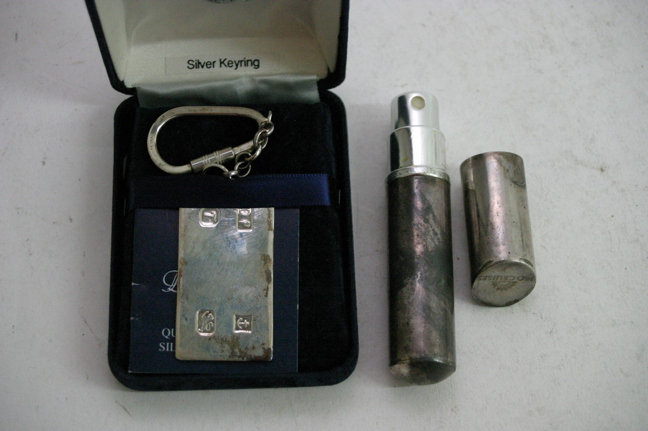 A hallmarked silver perfume atomiser and a boxed D