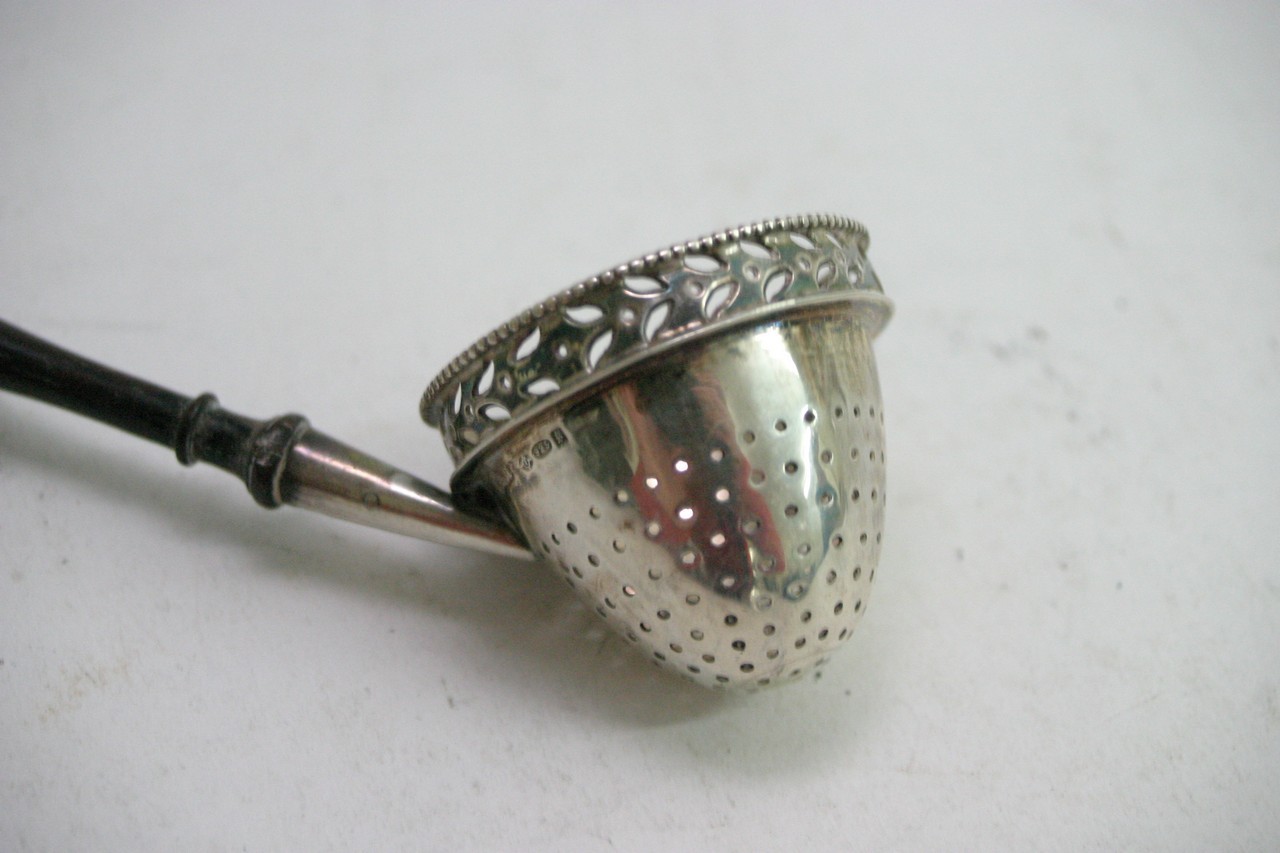 A continental silver straining ladle with turned w - Image 2 of 2