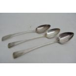 Three Georgian silver serving spoons, various hall