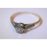An 18ct gold and platinum diamond ladies ring, the