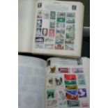 A collection of 8 albums of World potage stamps
