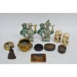 A collection of oriental items including a small f