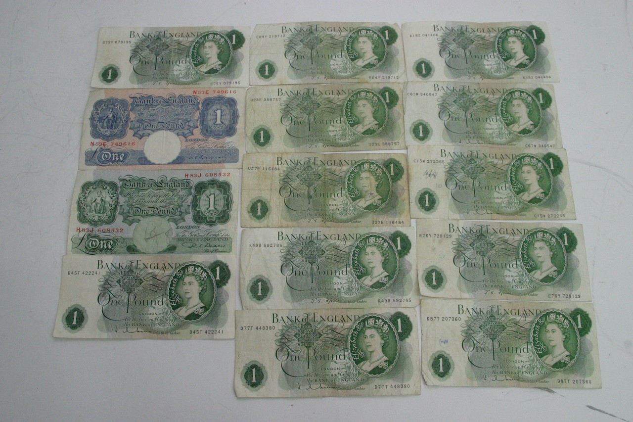 A collection of vintage GB one pound notes.