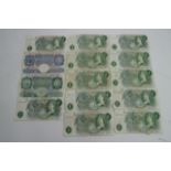 A collection of vintage GB one pound notes.