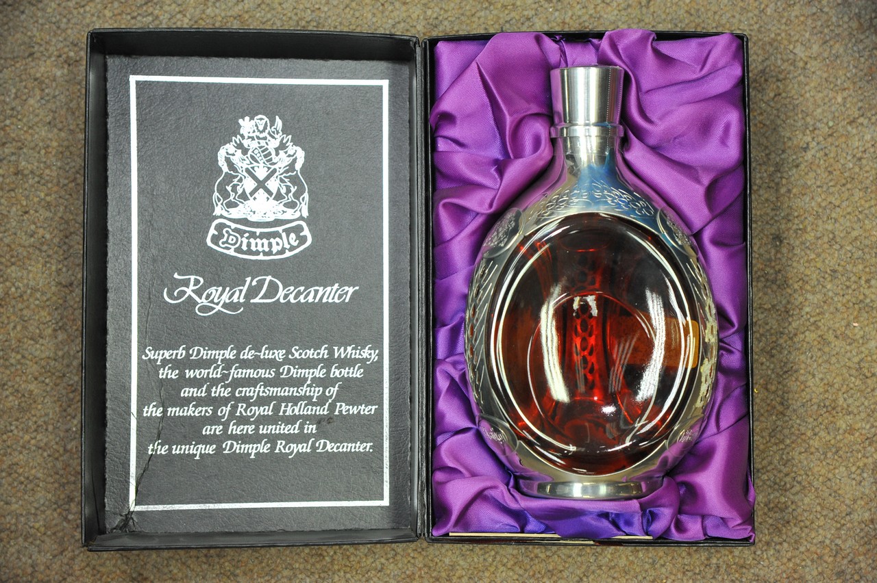 A boxed Dimple Royal Decanter sealed bottle of del