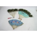 Three antique painted feather fans with pierced an