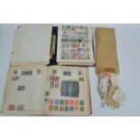 A collection of world postage stamps in 3 albums a