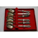 Cased set of six sterling spoons decorated with Bu