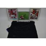 A collection of signed and framed Arsenal pictures