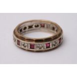 A gold and platinum eternity ring set with Ruby's