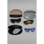 Three pairs of cased designer sunglasses including a Dior, Gucci and Bruce Oldfield (3).