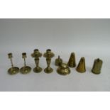 A small collection of brassware including candlesticks.