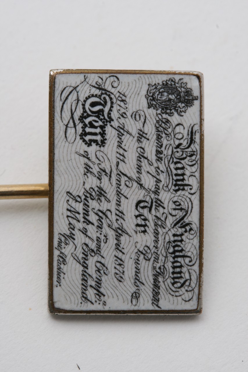 A tie pin in the form of a Victorian bank note. - Image 2 of 2